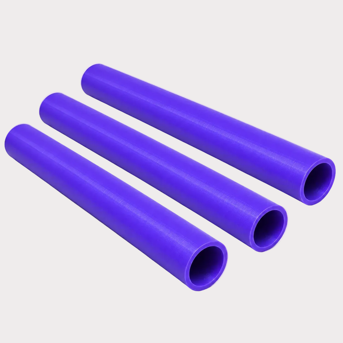 Three purple cylindrical tubes arranged diagonally on a plain white background.